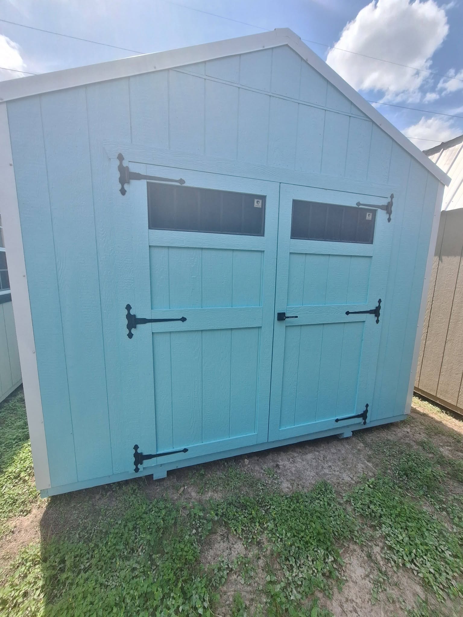 Custom-built portable buildings on display at the Mesquite Sheds & More lot in Alamo, TX