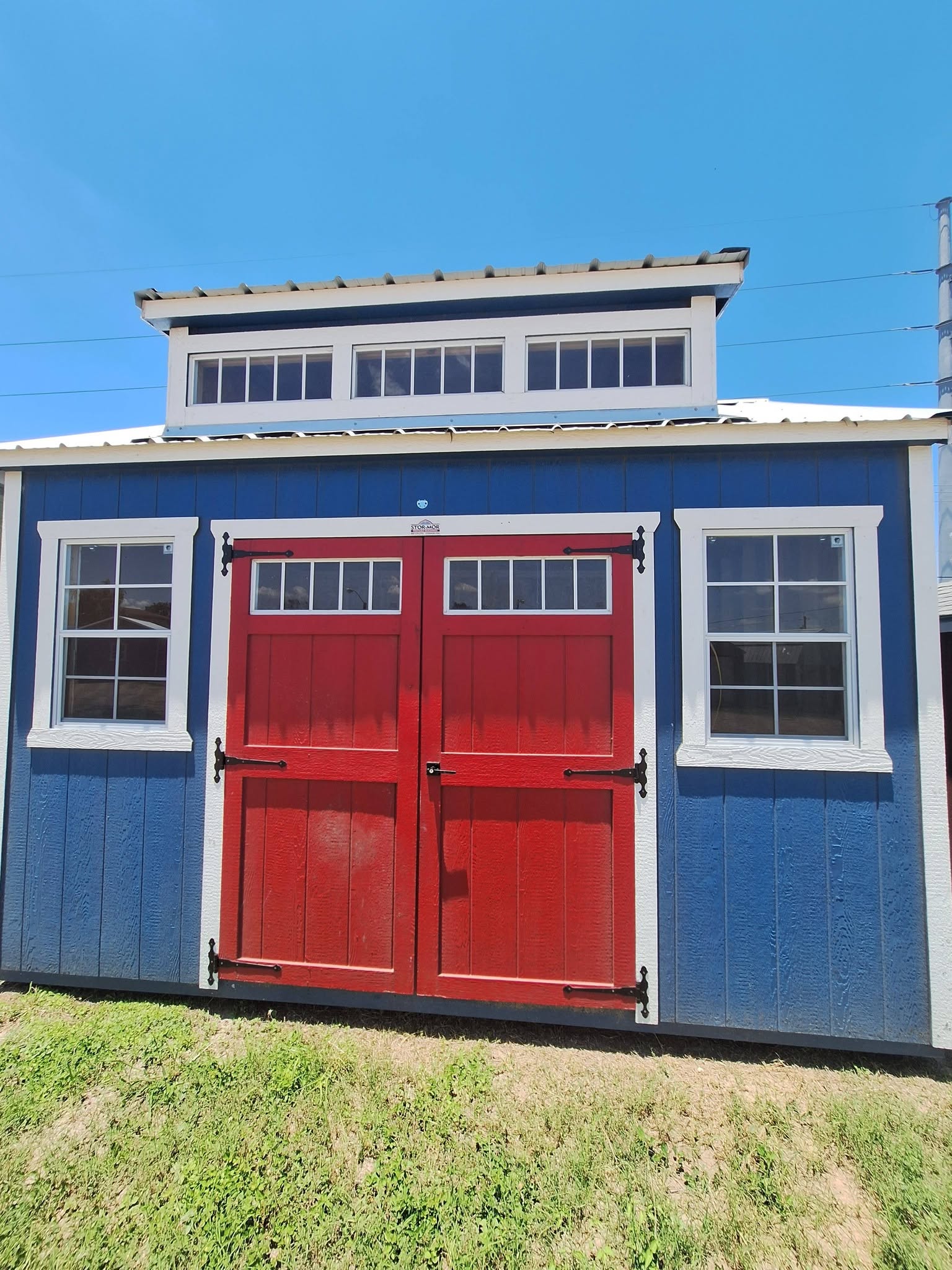 Portable cabin with double doors on our Alamo lot