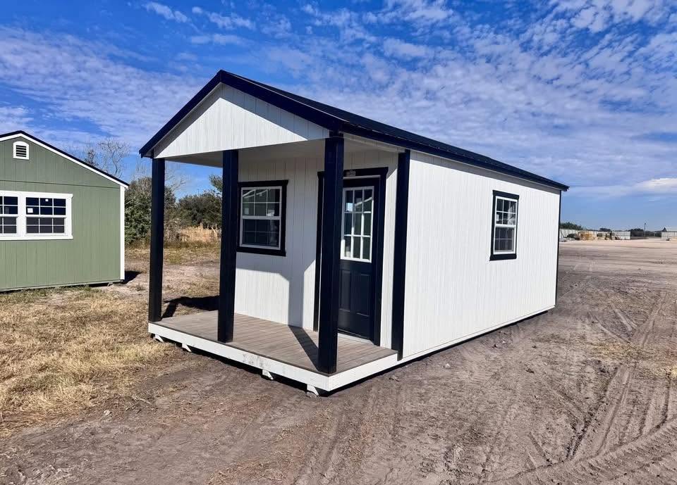 Finished portable cabin set up as a backyard office on the Mesquite Sheds & More lot in Alamo, TX