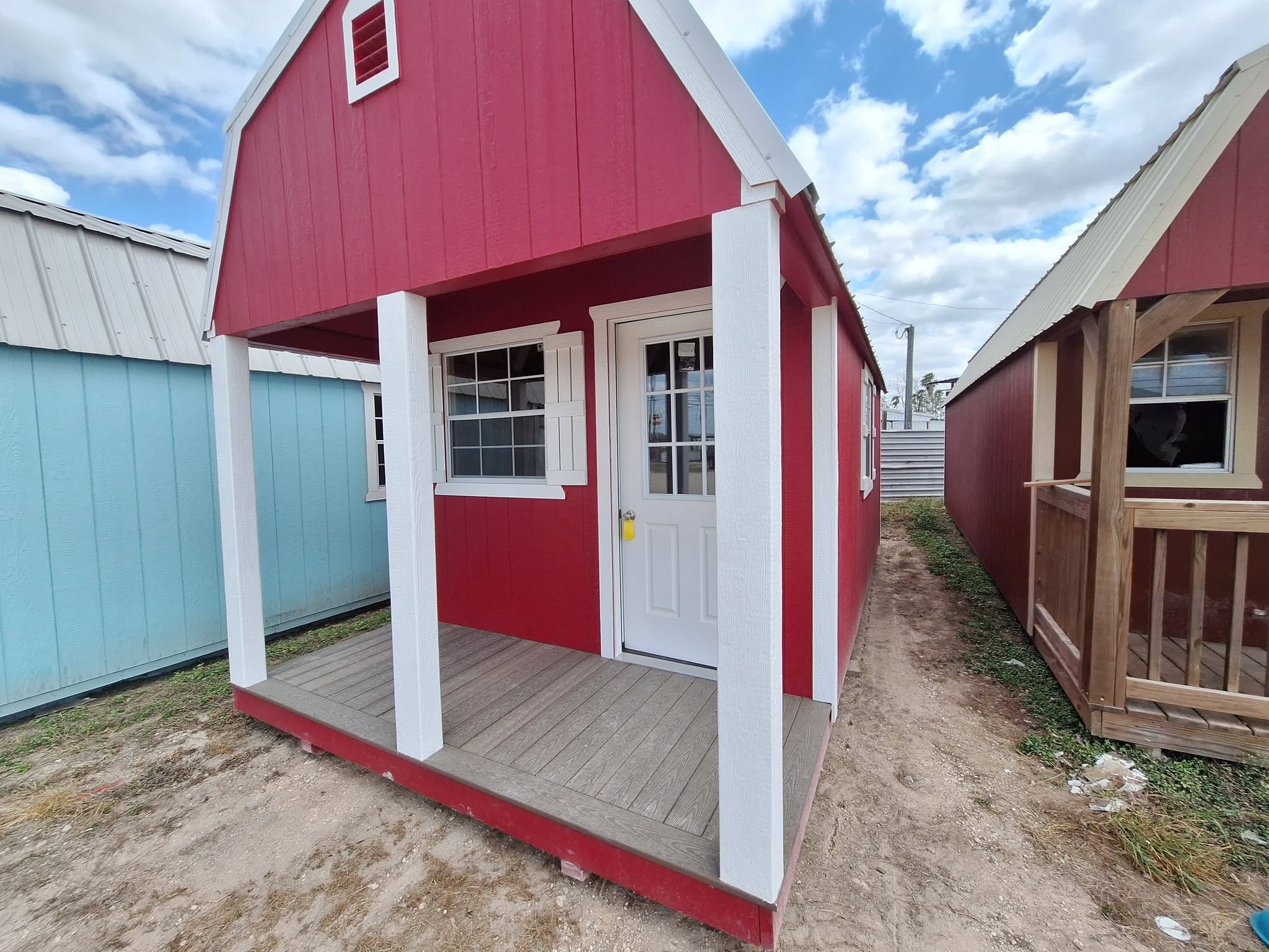 Lofted cabin with a front porch set up as a portable office in the Rio Grande Valley